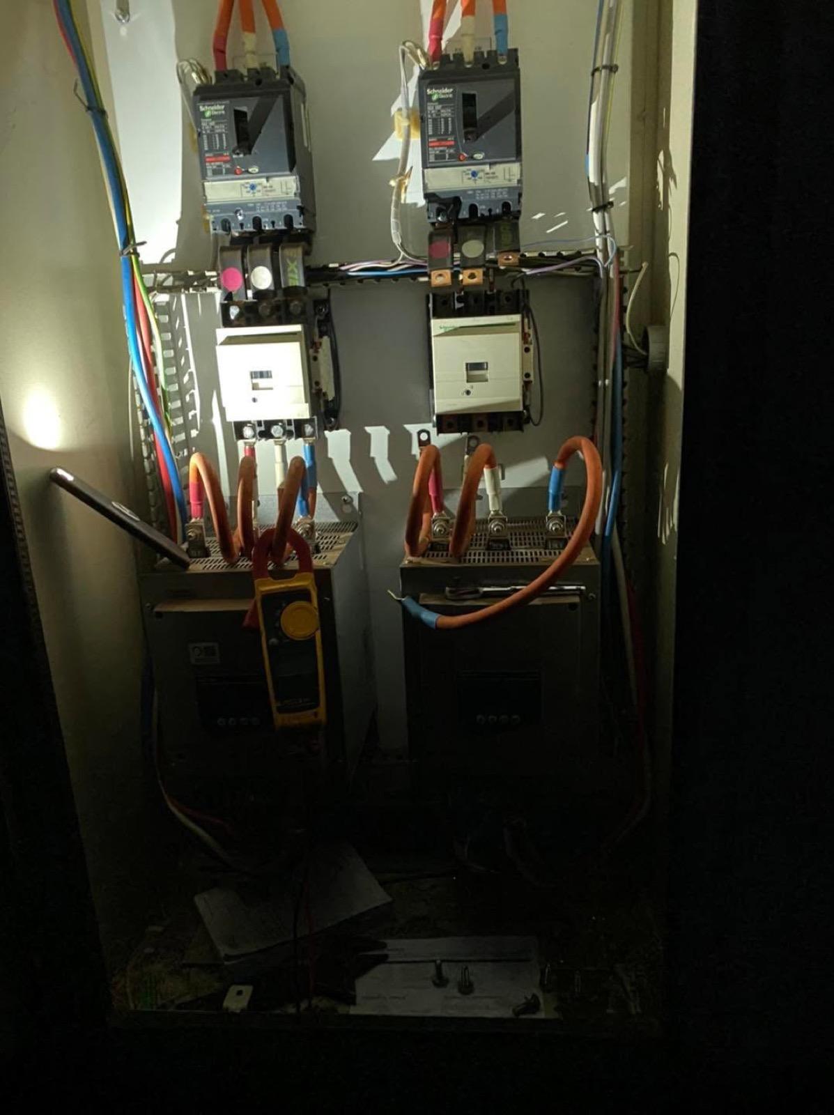 Industrial switchgear and contactors wired inside an electrical enclosure