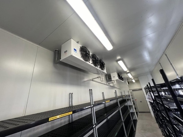 The inside of a new cool room with evaporator units mounted along the ceiling